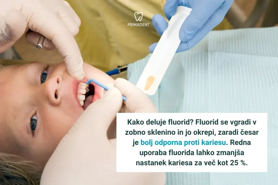 Zobozdravnica otroku nanaša fluorid na zobe